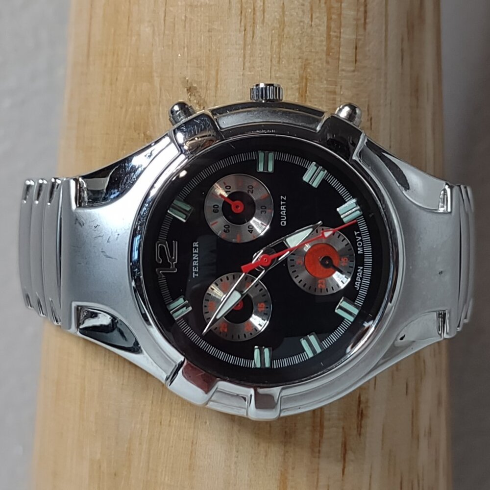 8 Inch Silver Tone Bijoux Terner Watch With Black And Red Dial